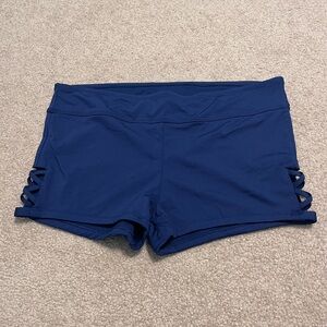 womens navy blue large swim shorts with cutout sides  NEVER WORN